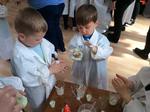 Two school kids making slime in a science workshop at the Science Zone UK in Bournemouth