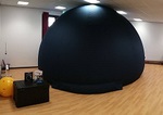 A dome for kids planetarium shows inside a school venue